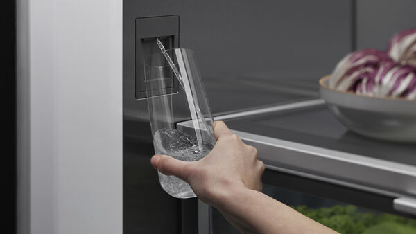 Internal water and ice dispenser