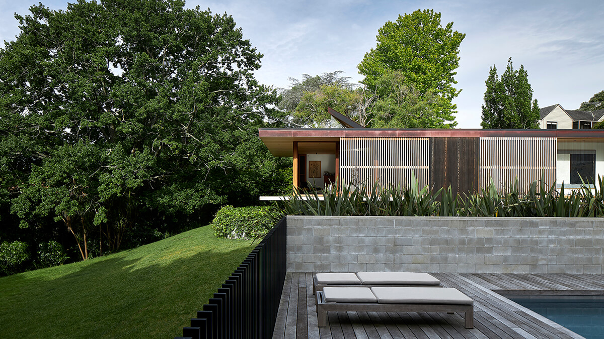 Exterior view of House number three looking across the pool.