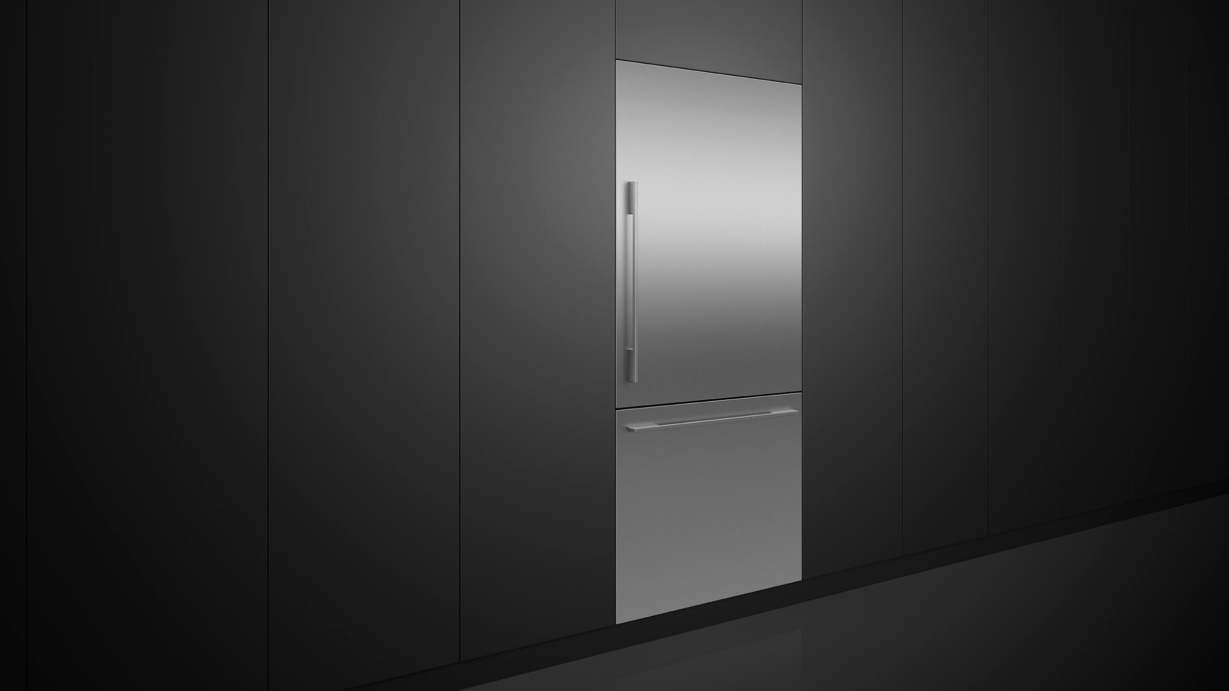 Integrated refrigerator and freezer columns fitted side-by-side in custom cabinetry