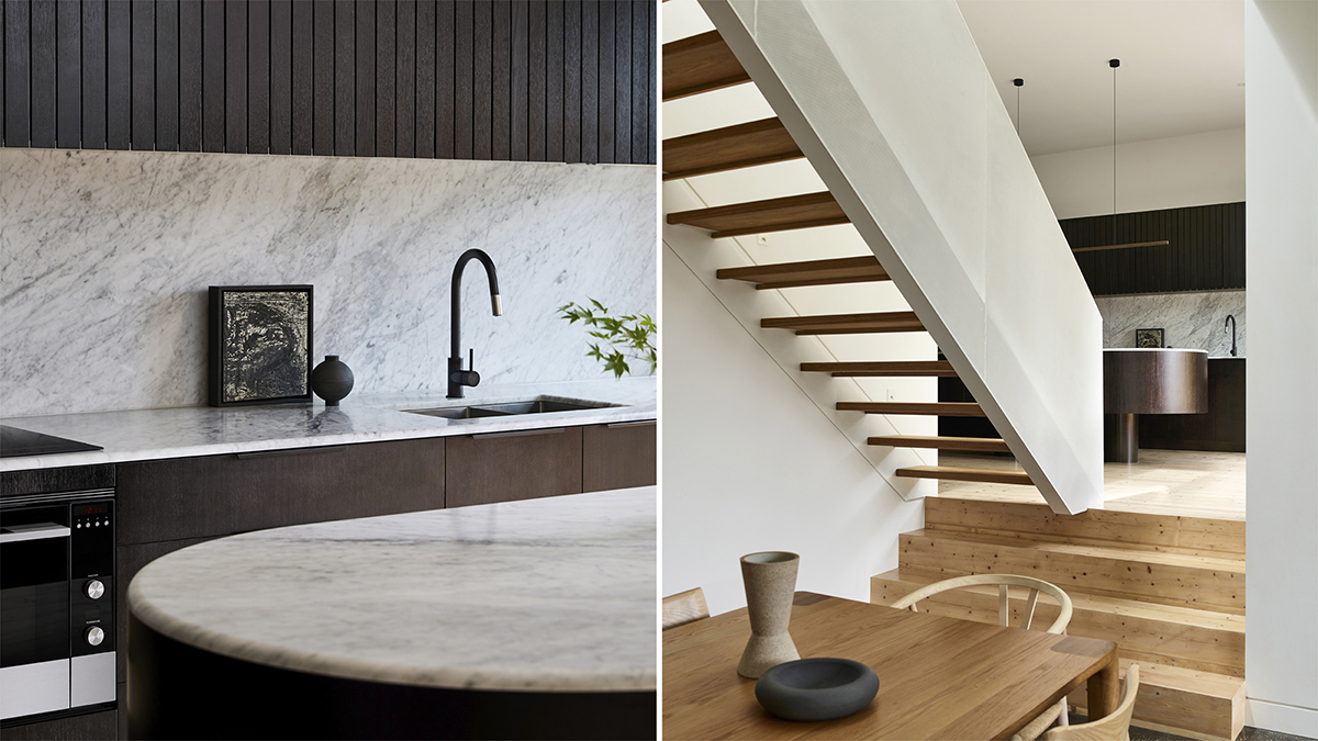 Marble kitchen island with a view of the lower dining area looking under the stairs.