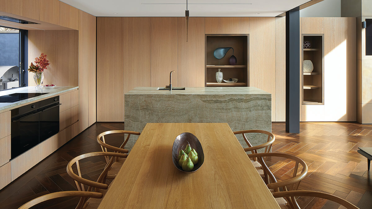 Wide angle photo of Herne Bay Townhouse' open floor plan kitchen.