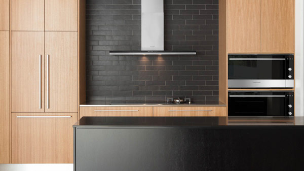 Modern Kitchen with a Black Glass Induction Cooktop and an Integrated Range Hood.