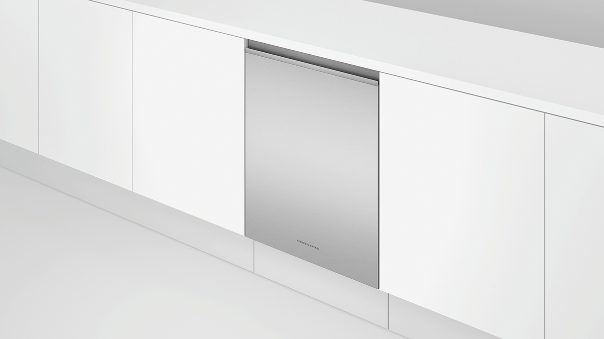 Built-in bottom freezer refrigerator with a stainless steel finish, aligned with modern kitchen cabinetry