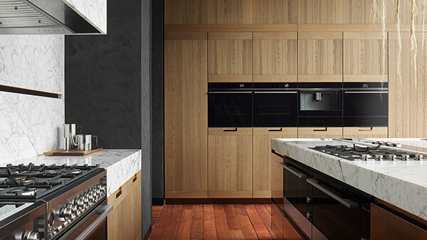 Light Cabinetry and Integrated Appliances in a Modern Kitchen.
