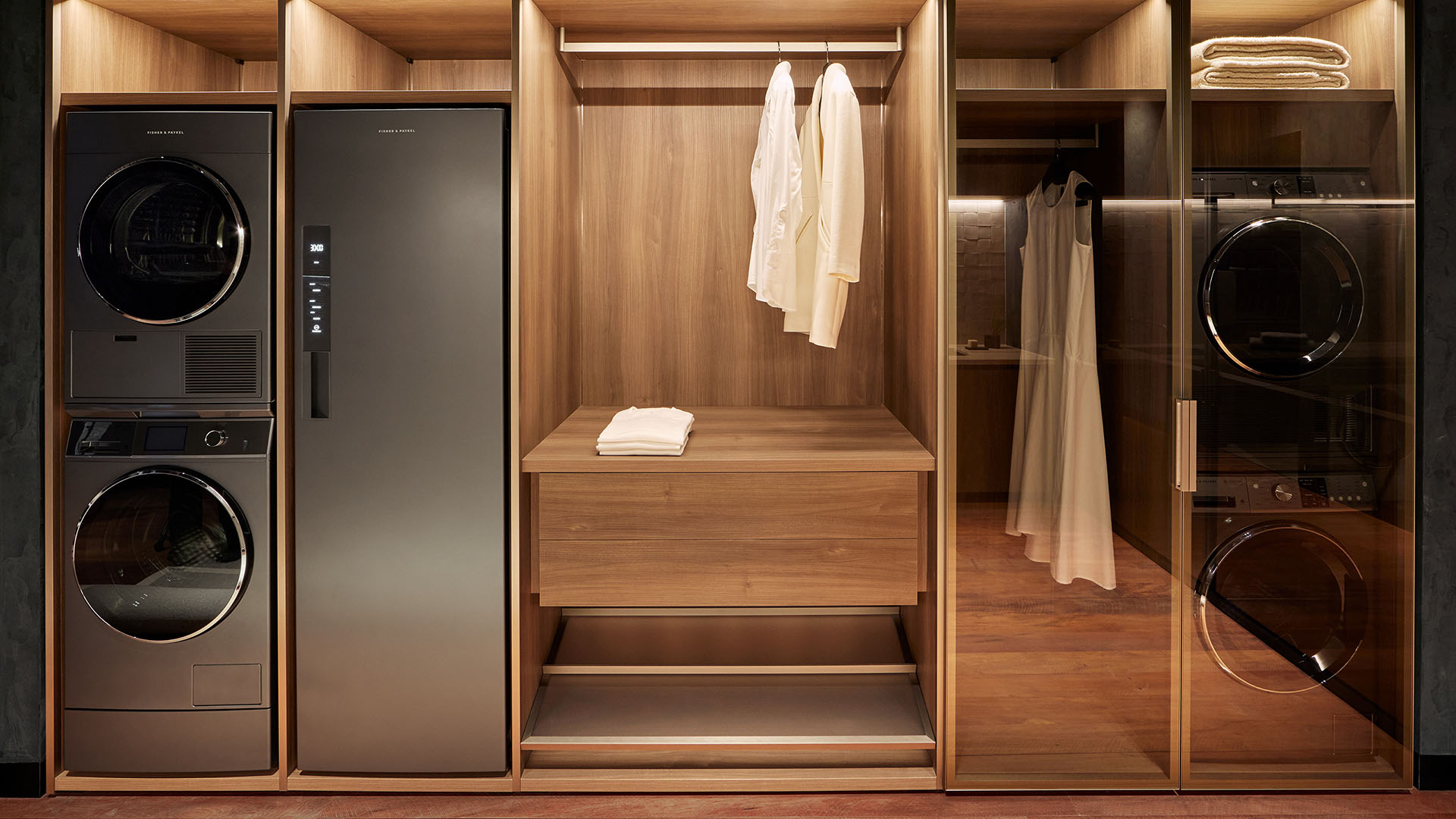 shot of the wardrobe system - showcasing the Fabric Care Cabinet and Steam Care washer and dryer