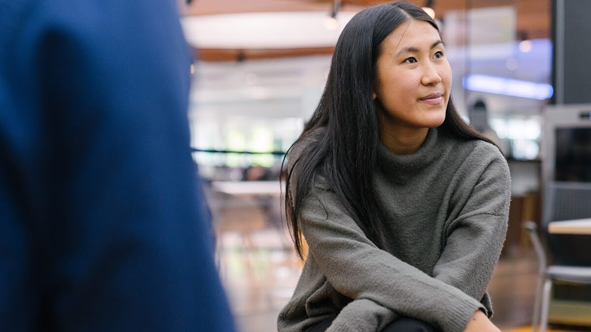 Fisher & Paykel female employee in a meeting.