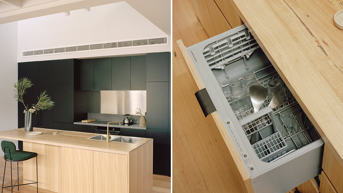 Kitchen island showing the black Induction cooktop and a view of integrated double DishDrawer™ dishwasher