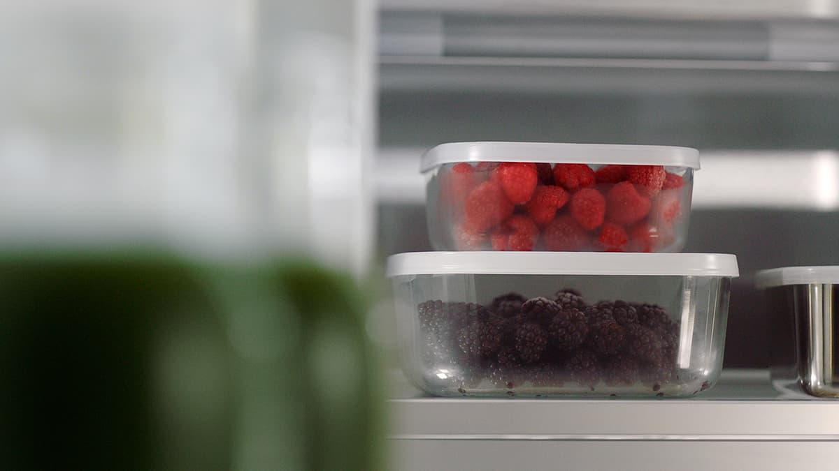 Frozen berries in a freezer drawer, illustrating stable preservation