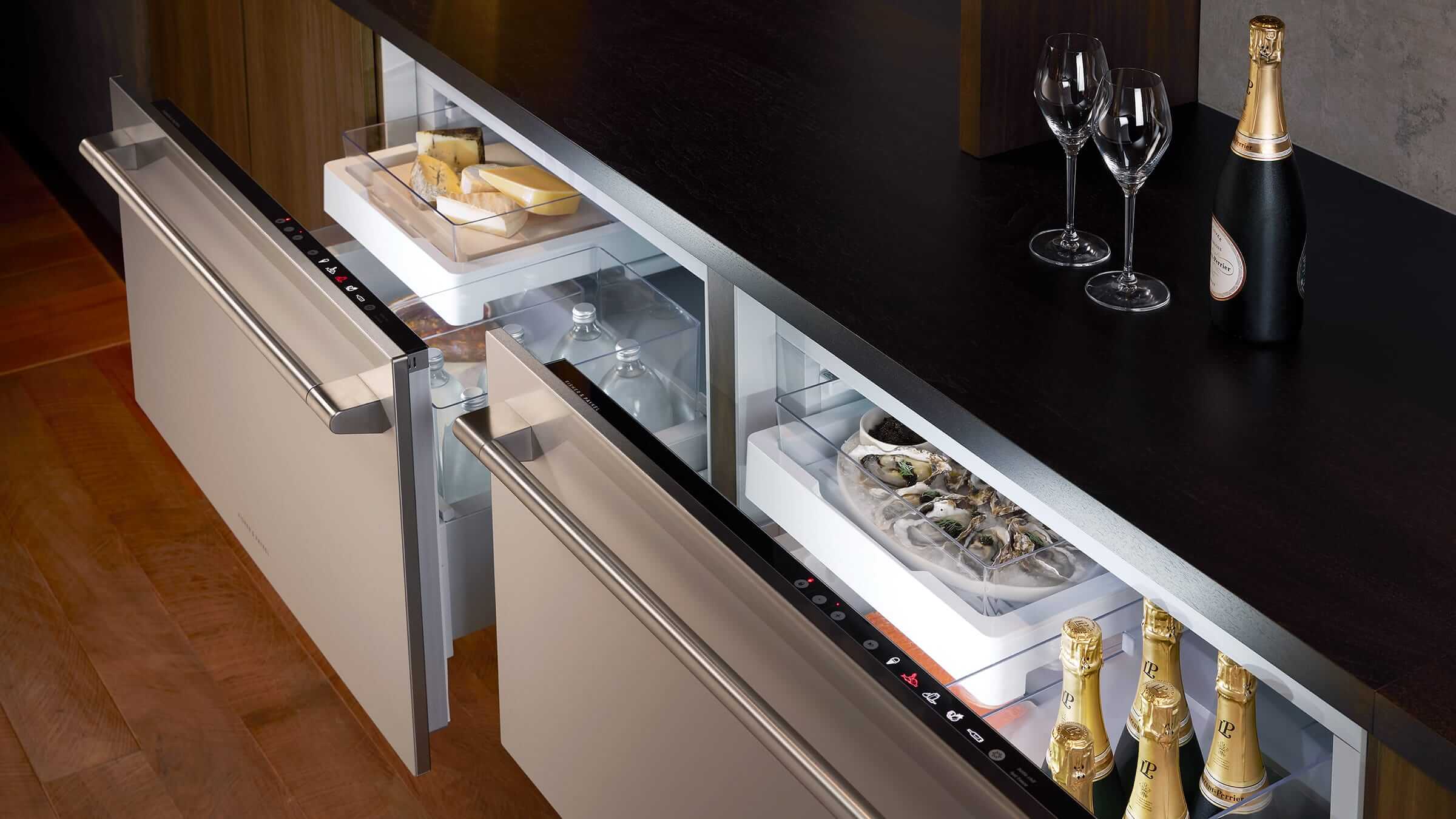 Interior of an open French Door refrigerator showing wide, organized shelving with fresh produce