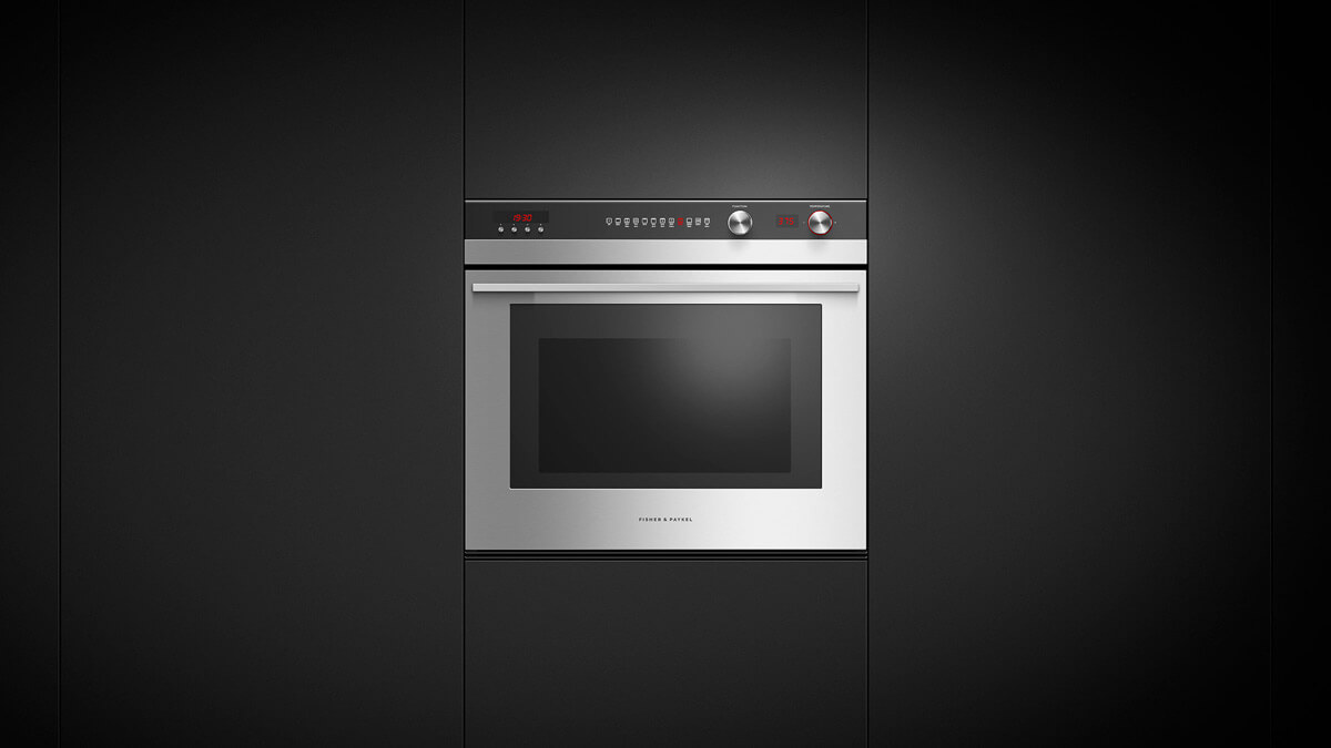 Built-in Oven with 11 Functions Set into Black Cabinetry.