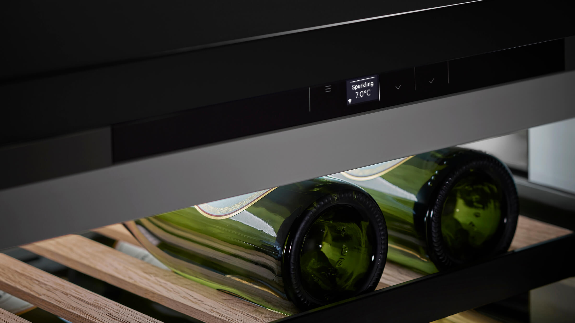 Curated presentation of bottles in an undercounter unit