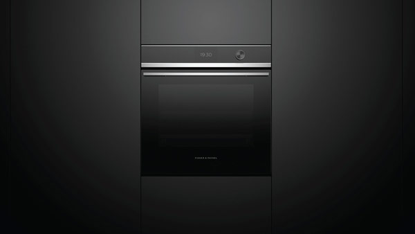 Built-in Convection Oven Set into Black Cabinetry.