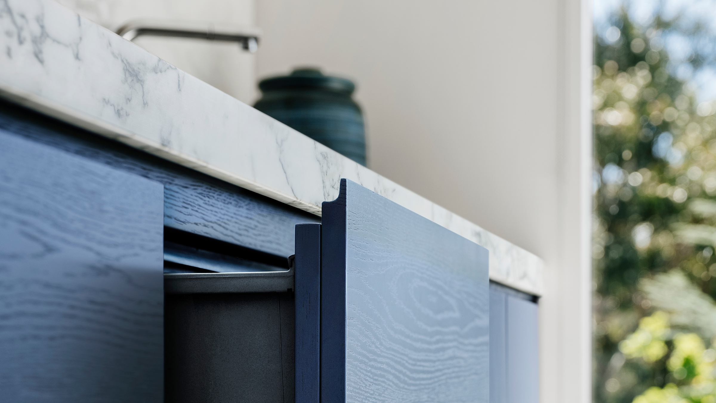 Integrated DishDrawer dishwasher seen in this Australian home designed by Flack Studio. Photograph: Adam Gibson