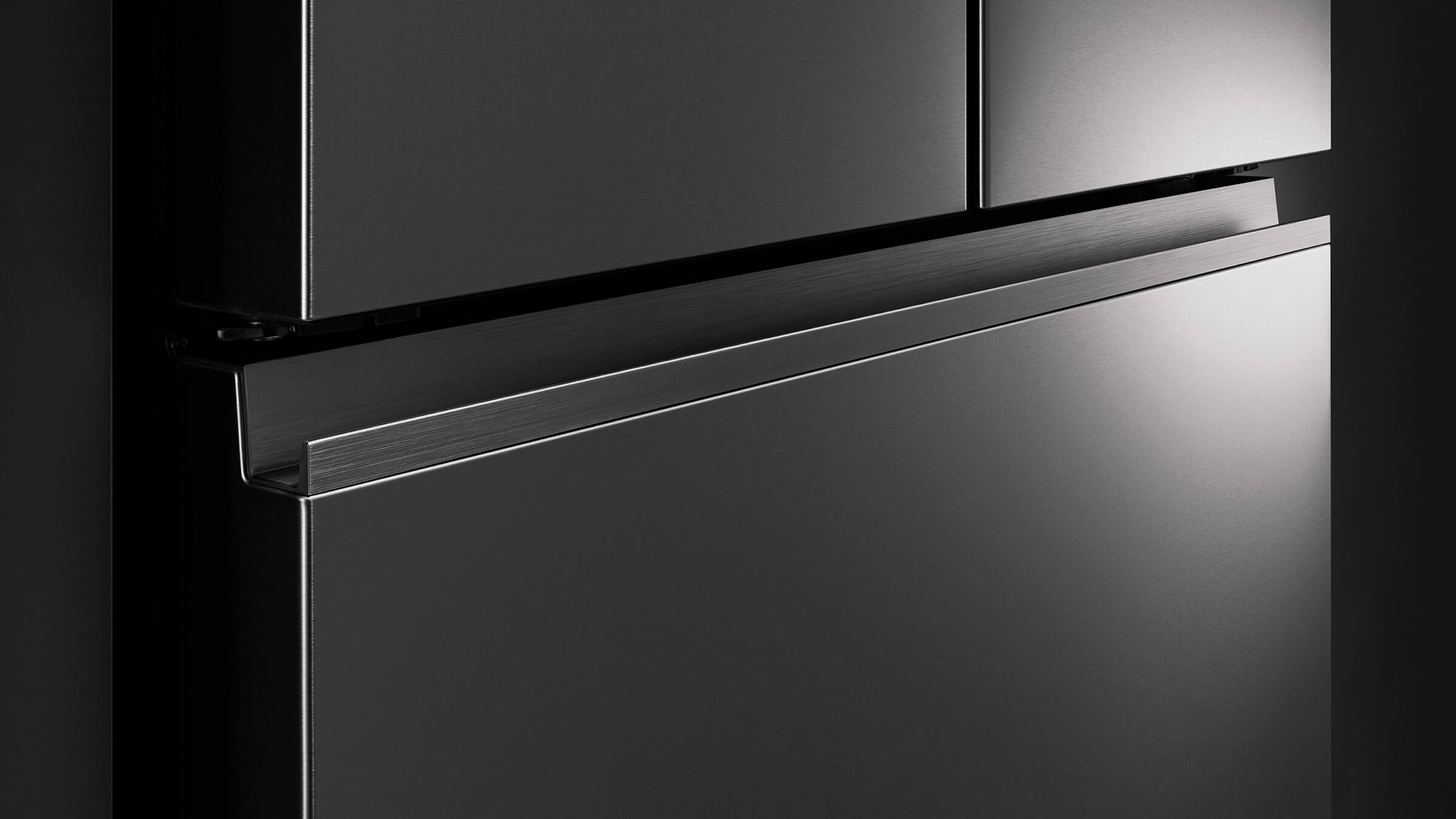 Freestanding stainless steel refrigerator with a contemporary single-door design