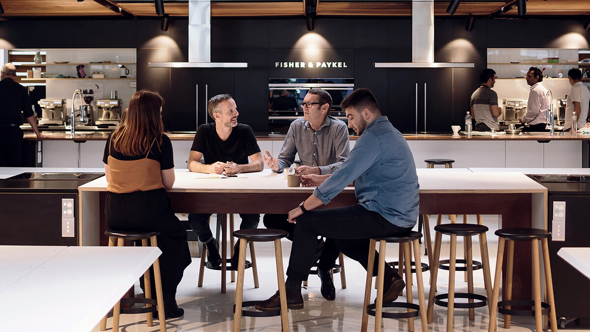 Fisher & Paykel employees collaborating in Auckland Design Center Social Kitchen™.