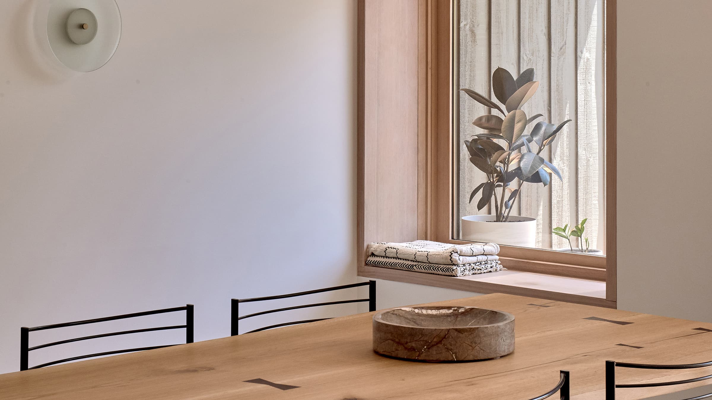 Shot of the Bianco house bathroom, showcasing the minimal palette.