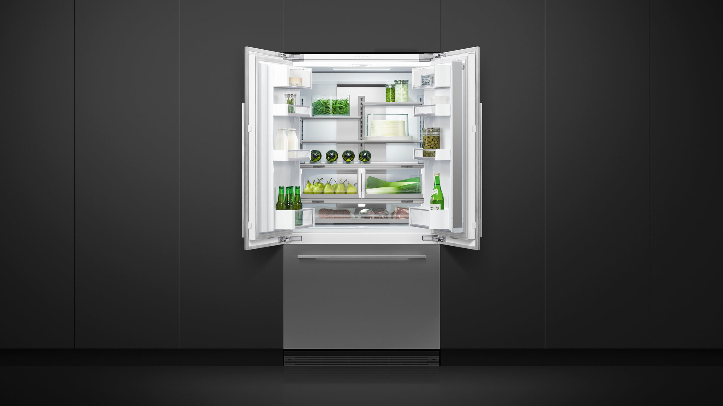Open view of an integrated French Door refrigerator showing a spacious and organized interior