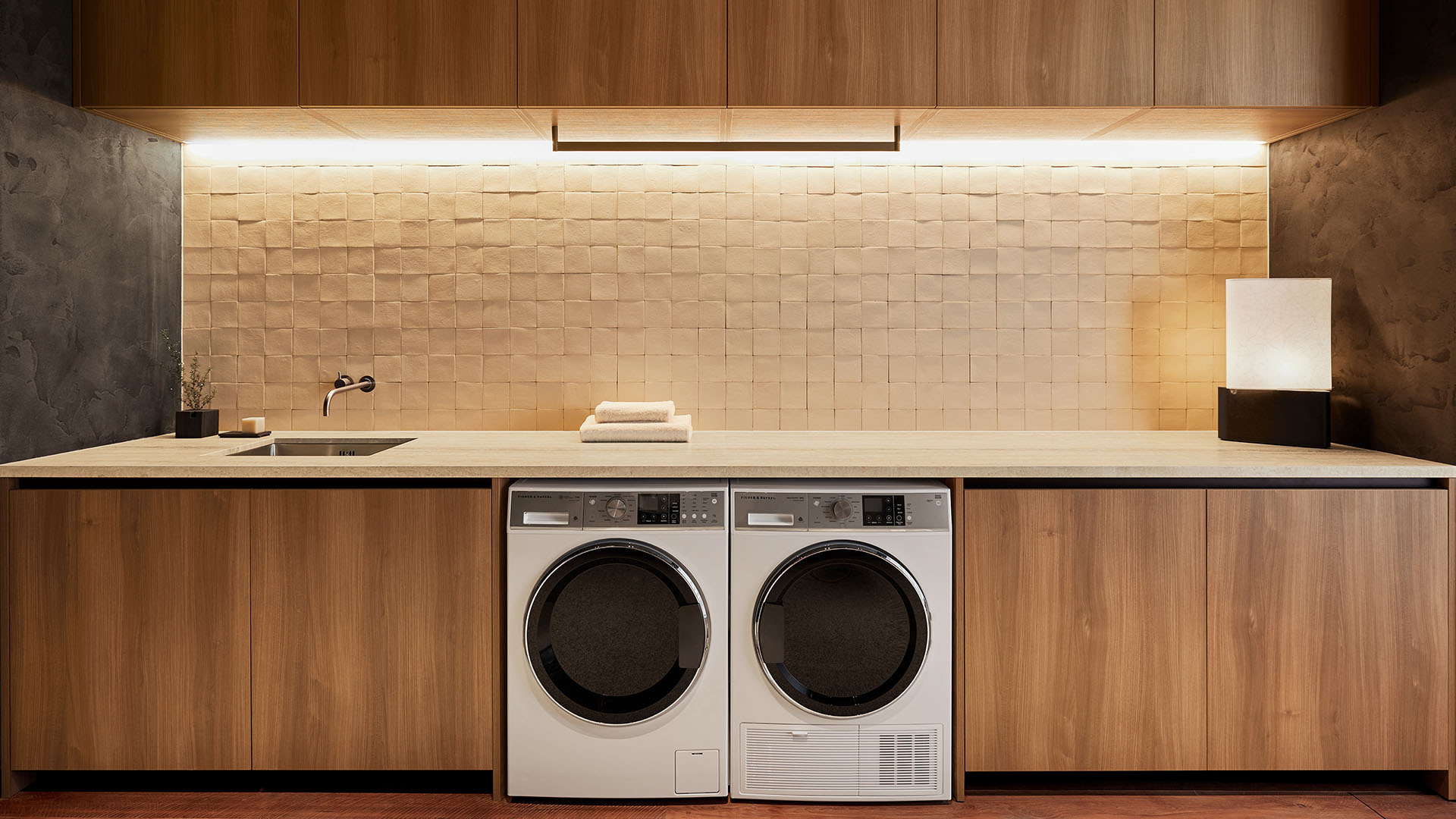 View of the hardware-free storage space, with a matching Steam Care waster and heat-pump dryer