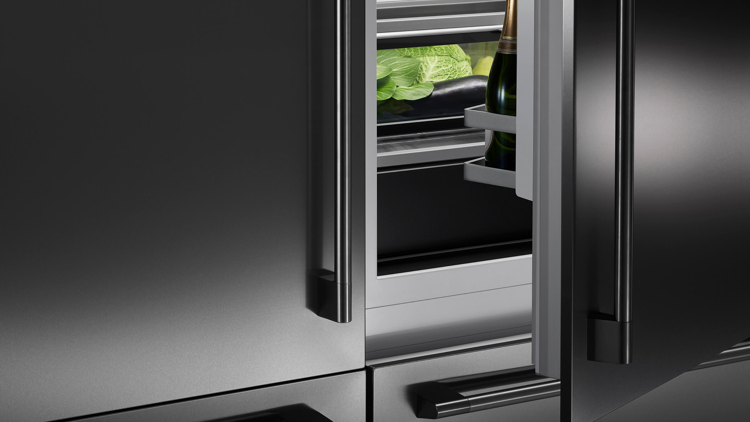 Detail view of the robust construction and hinges of a high-end bottom freezer refrigerator