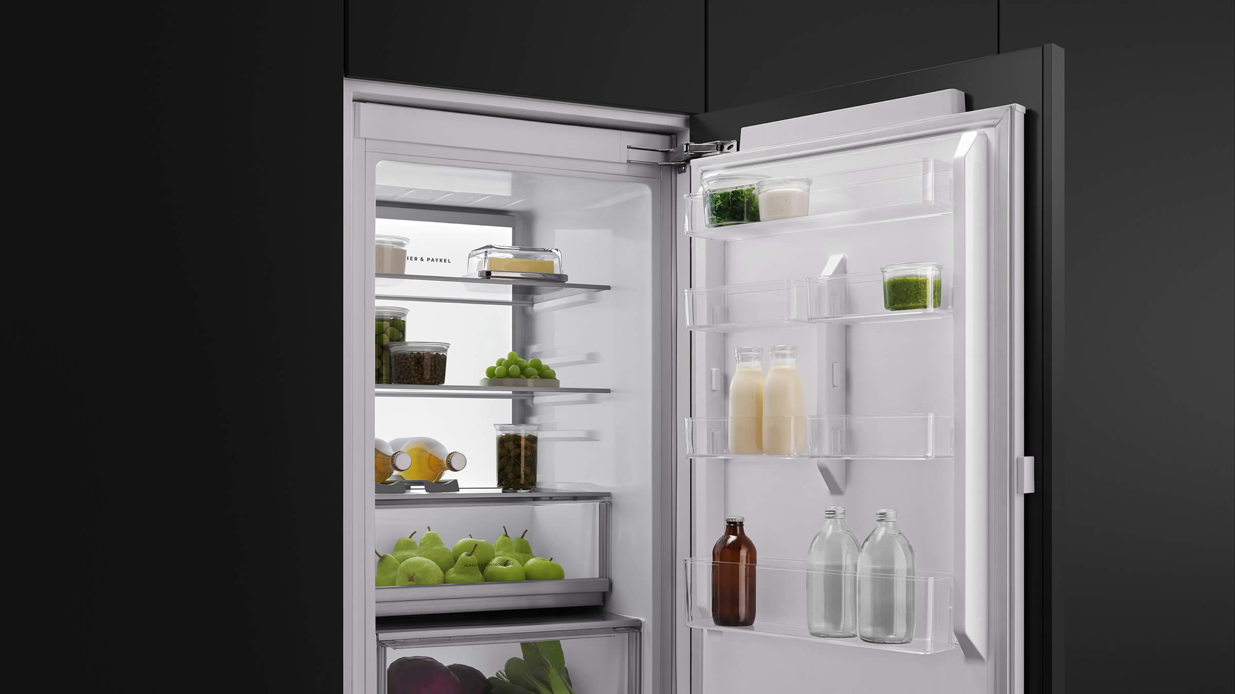 Interior view of an integrated refrigerator showing airflow vents for ActiveSmart technology