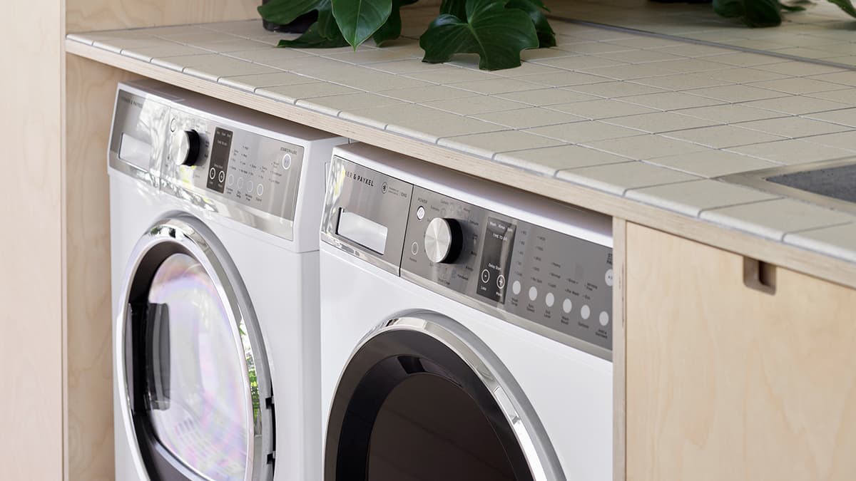 Laundry showing front loader washer and dryer side by side
