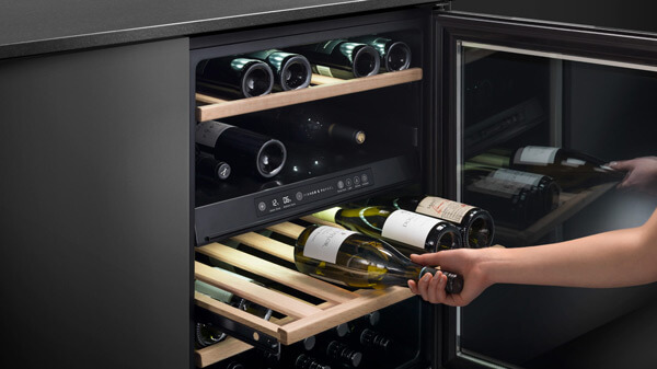 Close Up of Wine Bottles on Wine Cabinet Shelves