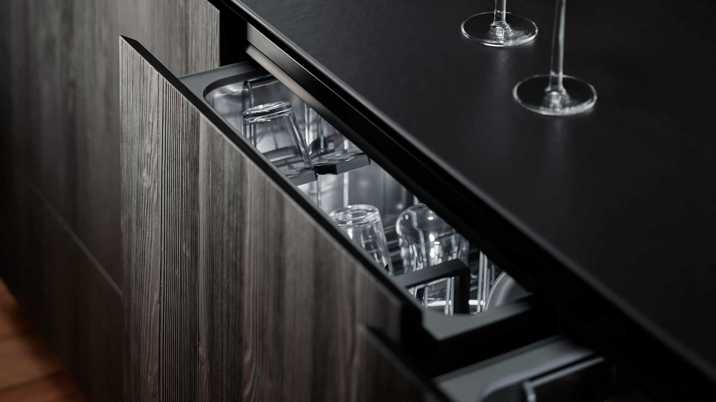 Wine column integrated into black cabinetry