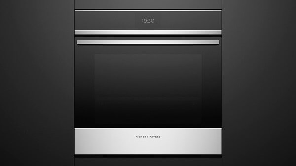 Built-in Convection Oven Set into Black Cabinetry.