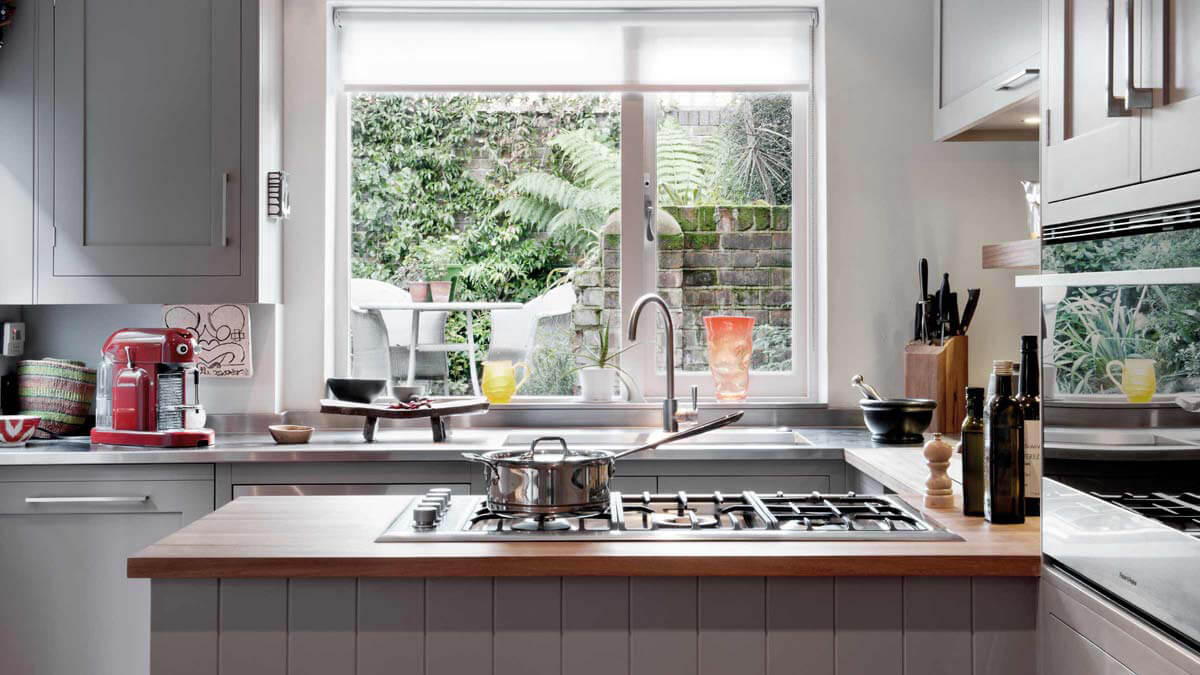 View of Peter Gordon's Kitchen at Victorian terrace house with Fisher & Paykel gas cooktop.