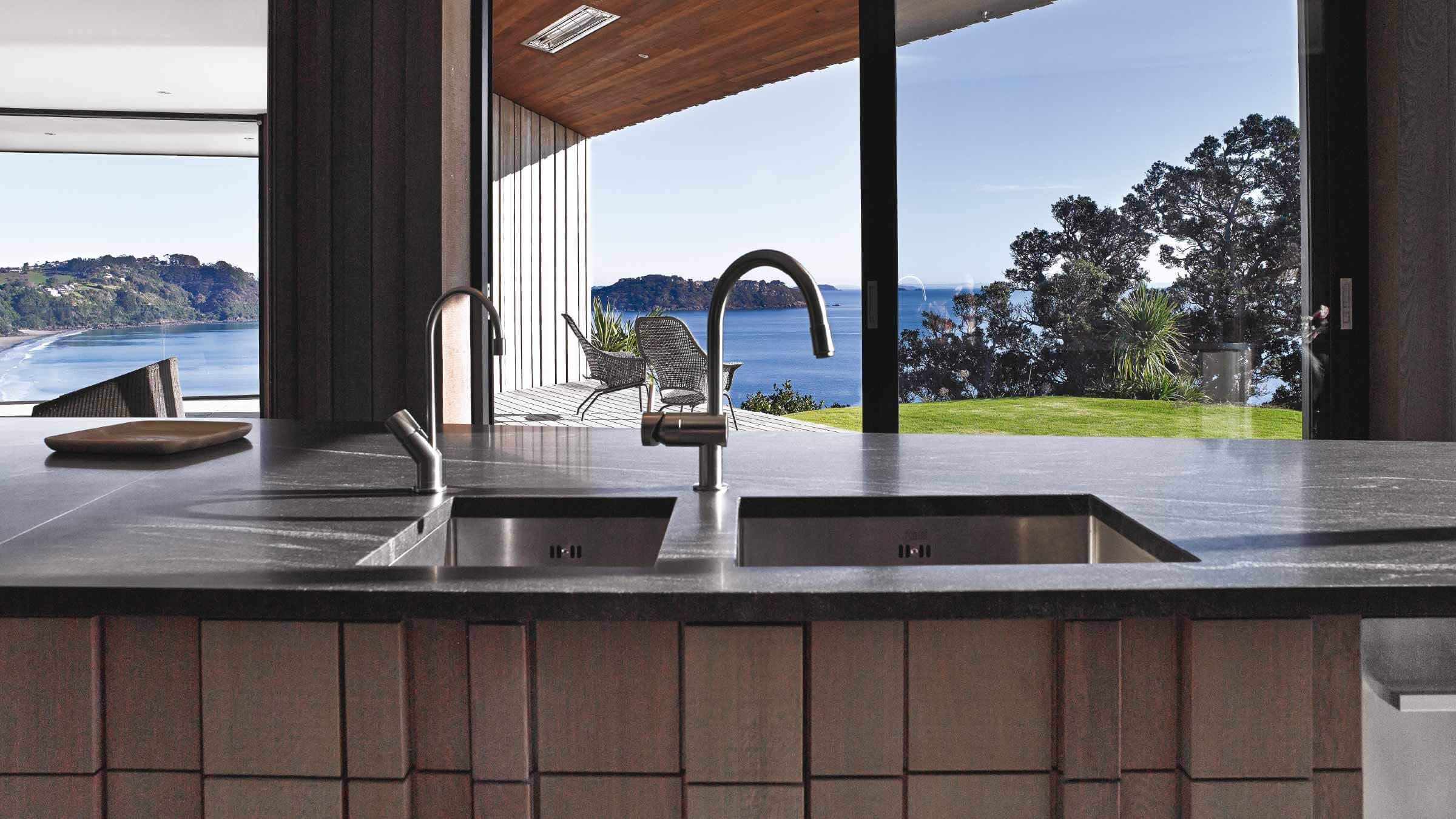 View from Headland House's Kitchen of the Sitting Room, Patio and Bay