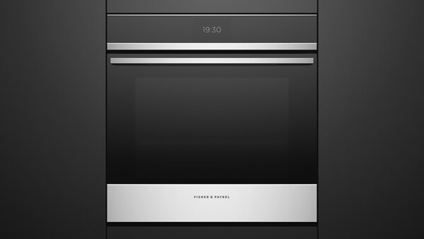 Built-in Convection Oven Set into Black Cabinetry.